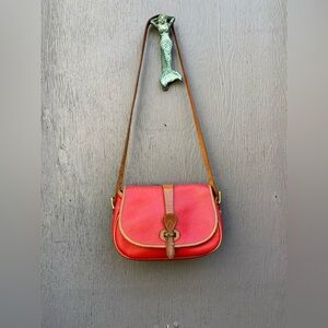 Dooney & Bourke Vintage Tack Saddle Bag in Red